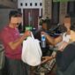 Bantuan berupa makanan siap saji untuk warga terdampak banjir wilayah Kota Denpasar dari Zulfikar Wijaya Anggota DPRD Prov. Bali Fraksi Gerindra Bali, 10 September 2025. © Okedaily Bali 